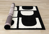 Florence Black White Dynamic Geometric Design, 5'3" x 7'4" Indoor Area Rug | Motif geometrique dynamique noir et blanc Florence, 5'3" x 7'4"