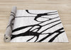 Emmett Grey Black Drizzle Swirl Rug, 7'10" x 10'6" Indoor Area Rug | Tapis Emmett gris et noir avec motif tourbillon, 7'10" x 10'6"