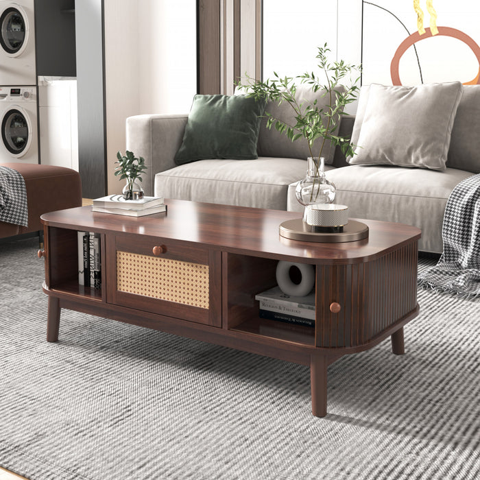 Grain 43.5 Inch Rattan Coffee Table with Sliding Doors, Drawers and Solid Wood Legs, Wood