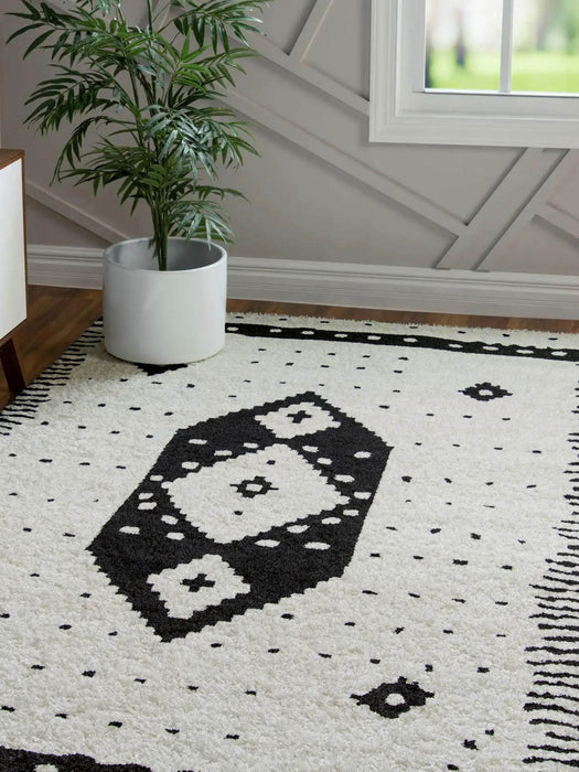 Lyra Contemporary 7'6\" x 9'6\" Area Rug in Ivory Indoor Area Rug