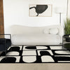 Florence Black White Dynamic Geometric Design, 6'7" x 9'6" Indoor Area Rug | Motif geometrique dynamique noir et blanc Florence, 6'7" x 9'6"