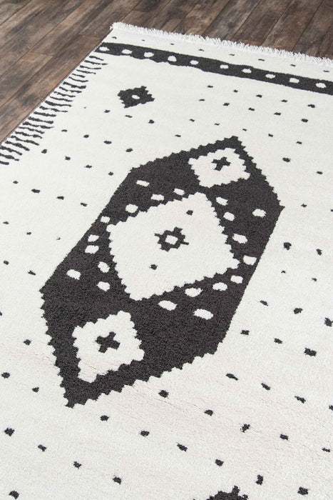 Lyra Contemporary 5'3\" x 7'2\" Area Rug in Ivory Indoor Area Rug