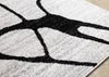 Emmett Grey Black Drizzle Swirl Rug, 5'3" x 7'7" Indoor Area Rug | Tapis Emmett gris et noir avec motif tourbillon, 5'3" x 7'7"