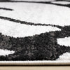 Emmett Grey Black Drizzle Swirl Rug, 5'3" x 7'7" Indoor Area Rug | Tapis Emmett gris et noir avec motif tourbillon, 5'3" x 7'7"