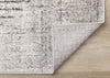 Solace Soft Low-Pile Grey White Merging Circles Area Rug - 6'7" x 9'6"|Carpette à poil court doux Solace grise et blanche à motif de cercles qui fusionnent - 6 pi 7 po x 9 pi 6 po