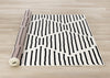 Forte Black White Stripes Area Rug - 4'7" x 6'7"|Carpette Forte noire et blanche à motif de rayures - 4 pi 7 po x 6 pi 7 po