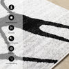 Emmett Grey Black Drizzle Swirl Rug, 7'10" x 10'6" Indoor Area Rug | Tapis Emmett gris et noir avec motif tourbillon, 7'10" x 10'6"