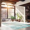 Janaki Teal 6'7" x 9'6" Area Rug