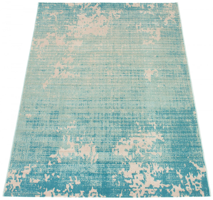 Janaki Teal 6'7\" x 9'6\" Area Rug