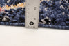 Makondo Abstract Navy Blue Area Rug - 6'7" x 9'6"
