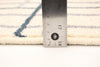 Taite Cream-Prol Area Rug - 7'10" x 10'2"