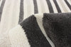 Nikkos Taupe 6'7" x 9'6" Area Rug