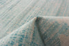 Janaki Teal 6'7" x 9'6" Area Rug