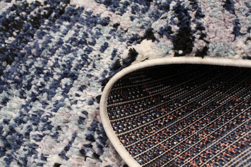 Makondo Abstract Blue Area Rug - 6'7\" x 9'6\"