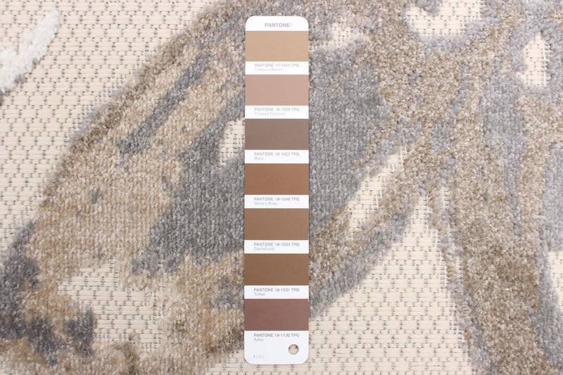 Angie Ivory Area Rug - 6'7\" X 9'6\" 