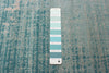 Janaki Teal 6'7" x 9'6" Area Rug