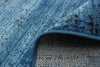 Janaki Blue 6'7" x 9'6" Area Rug