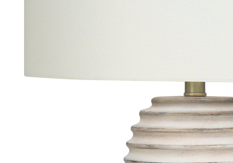 28\" Cream Textured Resin Table Lamp